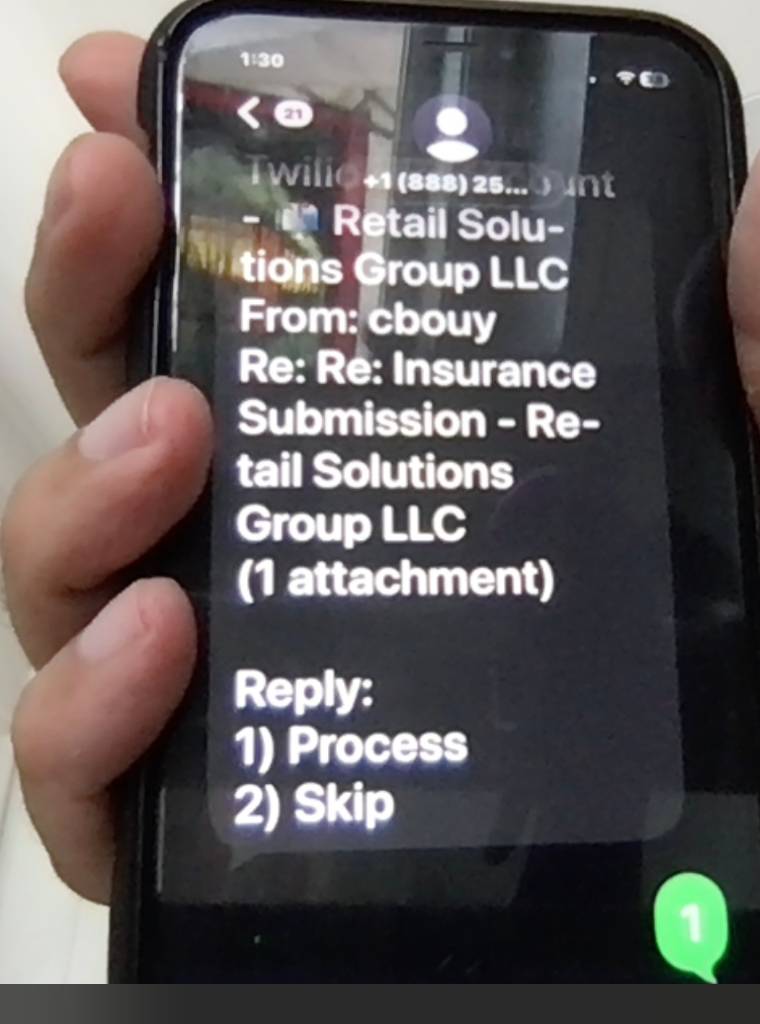 SMS notification alerting agent to new insurance quote ready for mobile processing